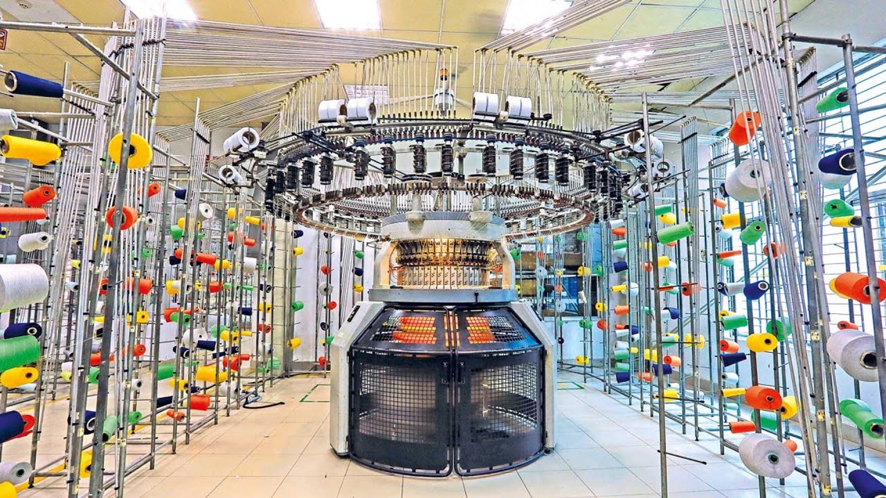 Tubular knit fabric production machine